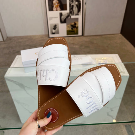 WOODY MULE IN WHITE LAMBSKIN WITH EMBROIDERED LOGO