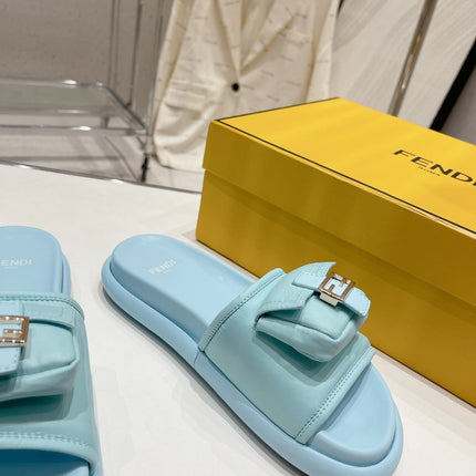 FENDI BAGUETTE SLIPPERS IN SKY BLUE LAMBSKIN WITH GOLD HARDWARE