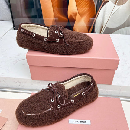 MIUMIU 26S BOAT LOAFERS IN DARK BROWN SHEARLING