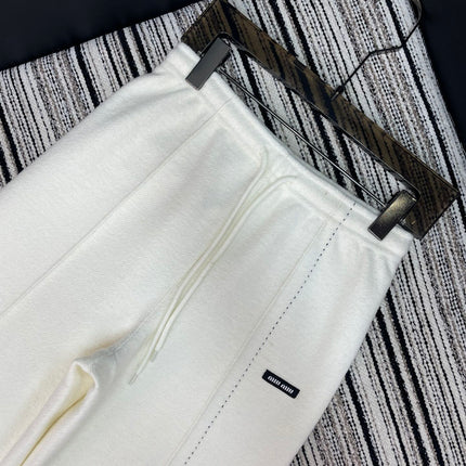 MIUMIU WIDE-LEG PANTS STYLE 653