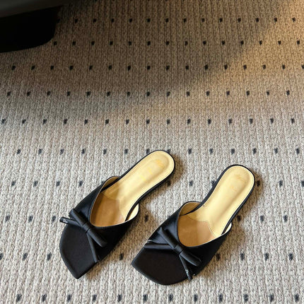 DIOR 26S OBLIQUE BOW MULE IN BLACK SATIN