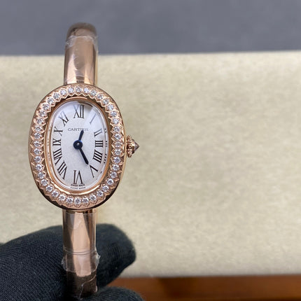 CARTIER BAIGNOIRE WATCH IN ROSE GOLD WITH DIAMOND-SET BEZEL