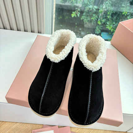 MIUMIU 26S ANKLE BOOTS IN BLACK SUEDE AND SHEARLING