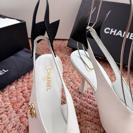 CHANEL 26S POINTED TOE HIGH HEEL SLINGBACKS IN WHITE LAMBSKIN WITH BLACK FLORAL APPLIQUE