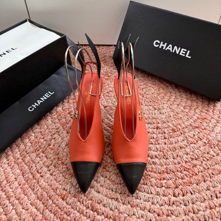CHANEL 26S POINTED TOE HIGH HEEL SLINGBACKS IN ORANGE LAMBSKIN WITH BLACK FLORAL APPLIQUE