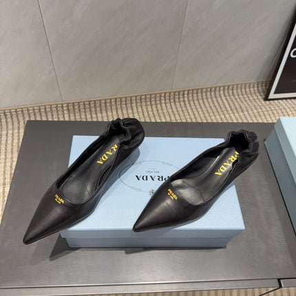PRADA 26S POINTED TOE PUMPS 55MM IN BLACK SHEEPSKIN WITH LOGO