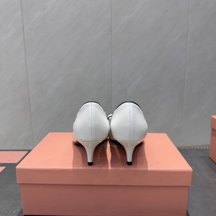 MIUMIU 26S POINTED TOE PUMPS 55MM IN WHITE AND BLACK CALFSKIN WITH BOW