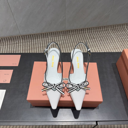 MIUMIU 26S SLINGBACK 55MM IN WHITE AND BLACK CALFSKIN WITH BOW