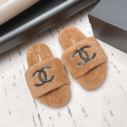 CHANEL 26S SLIDE MULES IN BROWN SHEARLING AND BLACK CC LOGO