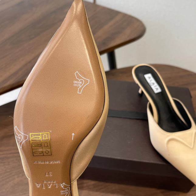 ALAIA 26S HEELED MULES 50 MM IN WARM BEIGE FABRIC