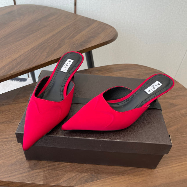 ALAIA 26S HEELED MULES 50 MM IN RED FABRIC