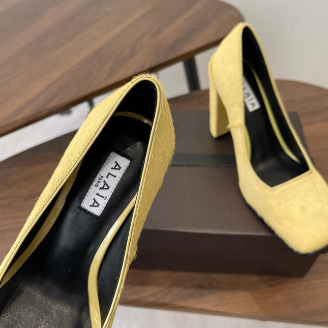 ALAIA 26S SQUARE-TOE HIGH HEELS 95 MM IN YELLOW PONY HAIR