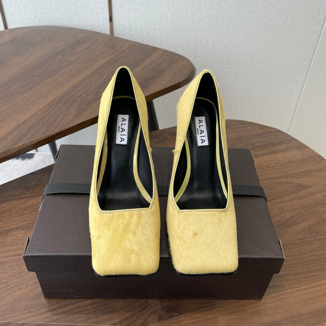 ALAIA 26S SQUARE-TOE HIGH HEELS 95 MM IN YELLOW PONY HAIR