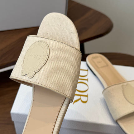 DIOR 26S D-BADGE FLAT SLIDE SANDALS IN IVORY WHITE CANVAS AND CALFSKIN