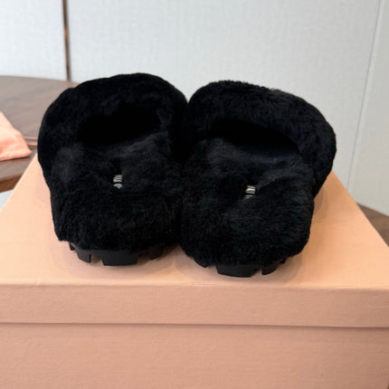 MIUMIU 26S CRYSTAL LOGO SLIDES IN BLACK SHEARLING