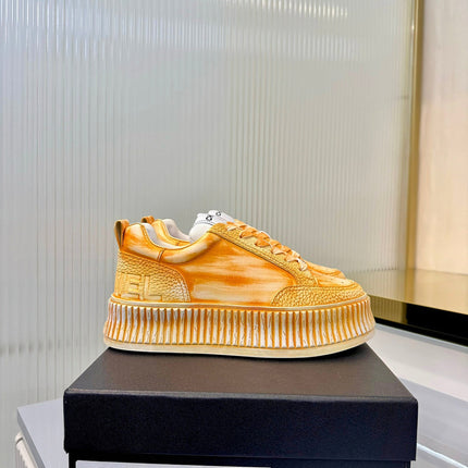CHANEL 26S LOW-TOP SNEAKERS IN GOLDEN ORANGE GRAFFITI PATTERN CALFSKIN