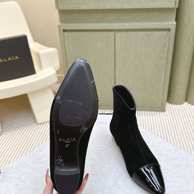 ALAIA 26S ANKLE BOOTS IN BLACK SUEDE AND GLOSSY CALFSKIN