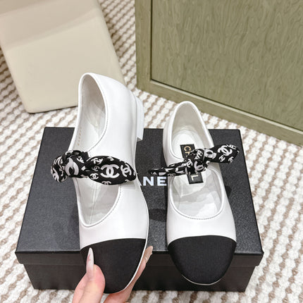 CHANEL 25S MARY JANES IN WHITE AND BLACK SHEARLING AND GROS GRAIN