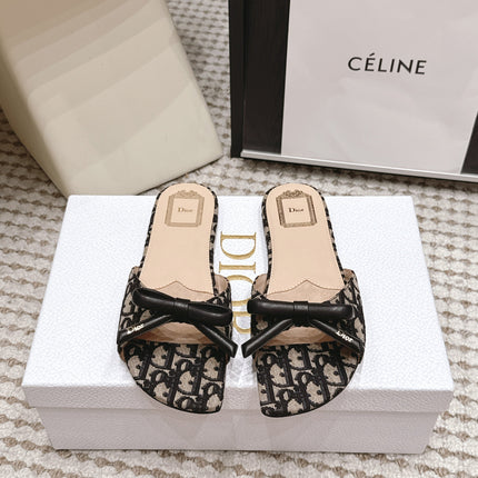 DIOR 26S FLAT SANDAL IN BLACK DIOR OBLIQUE JACQUARD WITH BOW
