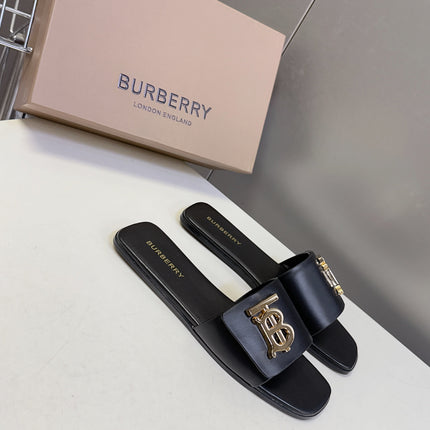 BURBERRY 26S FLAT SLIDE SANDALS IN BLACK CALFSKIN GOLD HARDWARE