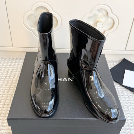 CHANEL 26S SHORT BOOTS IN BLACK PATENT LEATHER