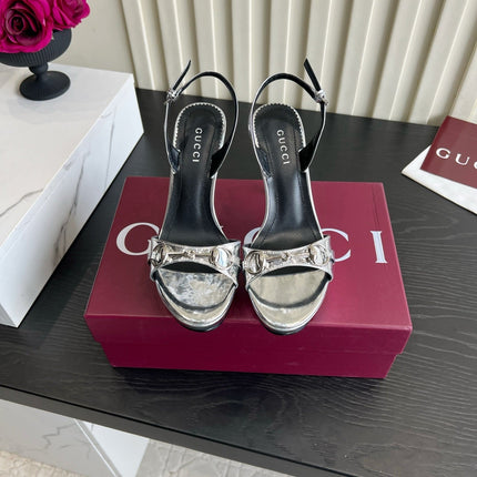GUCCI 26S HORSEBIT GG SANDALS 105 MM IN SILVER PATENT CALFSKIN