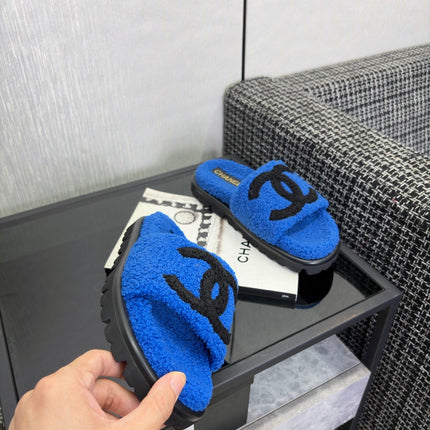 CHANEL 26S SLIDE SANDALS IN BLACK AND BLUE SHEARLING OPEN TOE