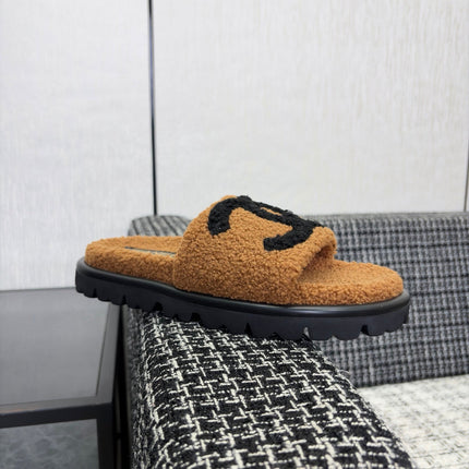 CHANEL 26S SLIDE SANDALS IN BLACK AND CAMEL SHEARLING OPEN TOE