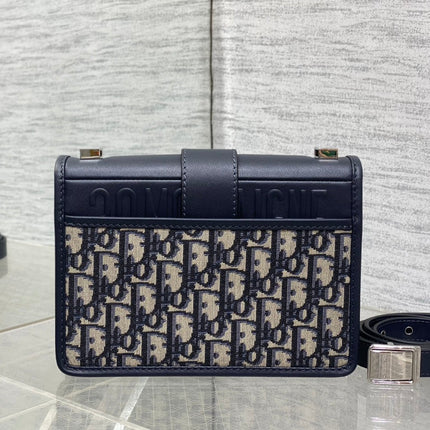 MONTAIGNE EAST-WEST 21 BAG WITH CHAIN IN NAVY BLUE LAMBSKIN AND MONOGRAM JACQUARD