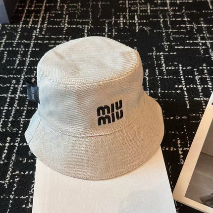 MIUMIU CLASSIC REVERSIBLE BUCKET HAT IN LIGHT BEIGE AND BLACK FABRIC