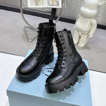 PRADA 25S WARRIOR BOOTS IN BLACK CALFSKIN