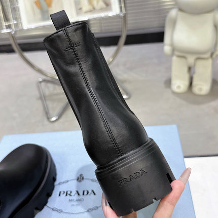 PRADA 25S RETRO PLATFORM MARTIN ANKLE BOOTS IN BLACK CALFSKIN