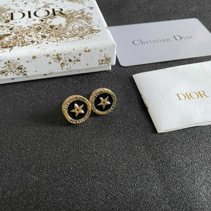 CD 26S STAR MEDALLION LOGO STUD EARRINGS IN BLACK ENAMEL & GOLD TONE METAL 631813