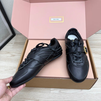 MIUMIU 26S BUCKLE SNEAKERS IN BLACK CALFSKIN WITH GOLD HARDWARE