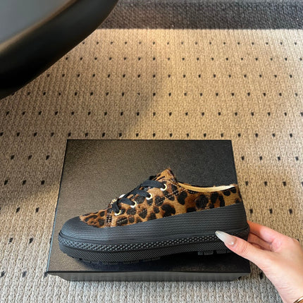 CHANEL 26S LACE UP SNEAKERS IN BLACK CALFSKIN AND BROWN PONY HAIR LEOPARD PRINT