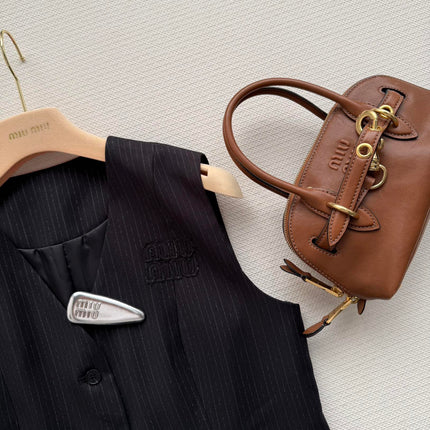 MIUMIU 26S SET VEST AND PLEATED SKIRT 867