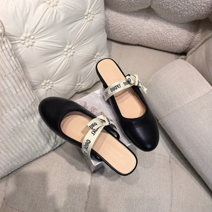 DIOR 26S FLAT MULES IN BLACK CALFSKIN WITH J'ADIOR BOW