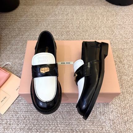MIUMIU 26S COIN PENNY LOAFERS IN BLACK MIX WHITE CALFSKIN