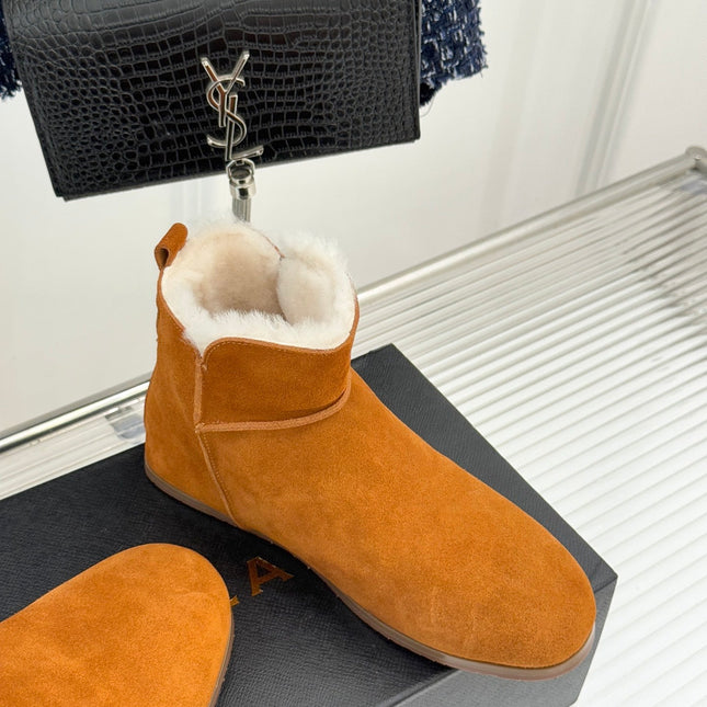 ALAIA 26S SNOW BOOTS IN DARK ORANGE SUEDE AND WOOL
