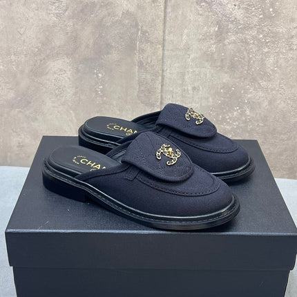 CHANEL 26S MULE LOAFERS IN BLACK CANVAS WITH QUILTED FLAP & CHAIN CC LOGO