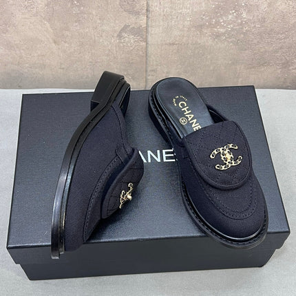 CHANEL 26S MULE LOAFERS IN BLACK CANVAS WITH QUILTED FLAP & CHAIN CC LOGO