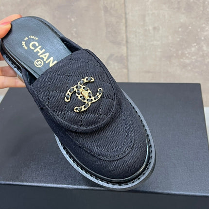 CHANEL 26S MULE LOAFERS IN BLACK CANVAS WITH QUILTED FLAP & CHAIN CC LOGO
