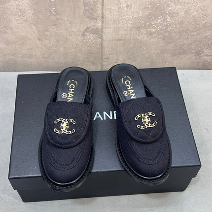 CHANEL 26S MULE LOAFERS IN BLACK CANVAS WITH QUILTED FLAP & CHAIN CC LOGO