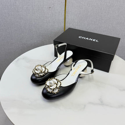 CHANEL 26S CAMELLIA PEARL SLINGBACKS IN BLACK CALFSKIN