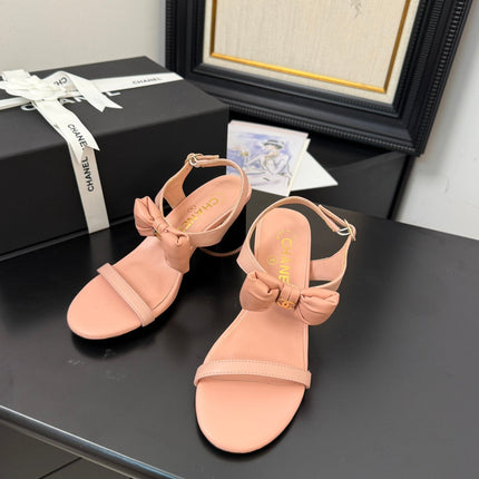 MID HEEL SANDALS IN PEACHY PINK CALFSKIN WITH BOW