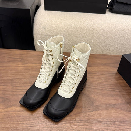 CHANEL 26S LACE UP HIGH TOP BOOTS 45 MM IN BLACK AND WHITE CALFSKIN