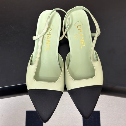 CHANEL 26S POINTED TOE SLINGBACKS IN PASTEL GREEN LAMBSKIN AND BLACK FABRIC