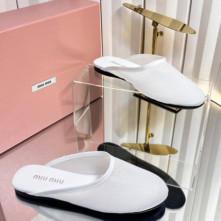 MIUMIU 26S FLAT MULES IN WHITE FABRIC AND LEATHER