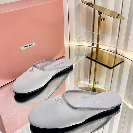 MIUMIU 26S FLAT MULES IN GREY FABRIC AND LEATHER