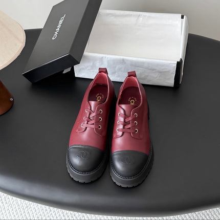 CHANEL 26S LACE UP PLATFORM IN BLACK AND RED CALFSKIN